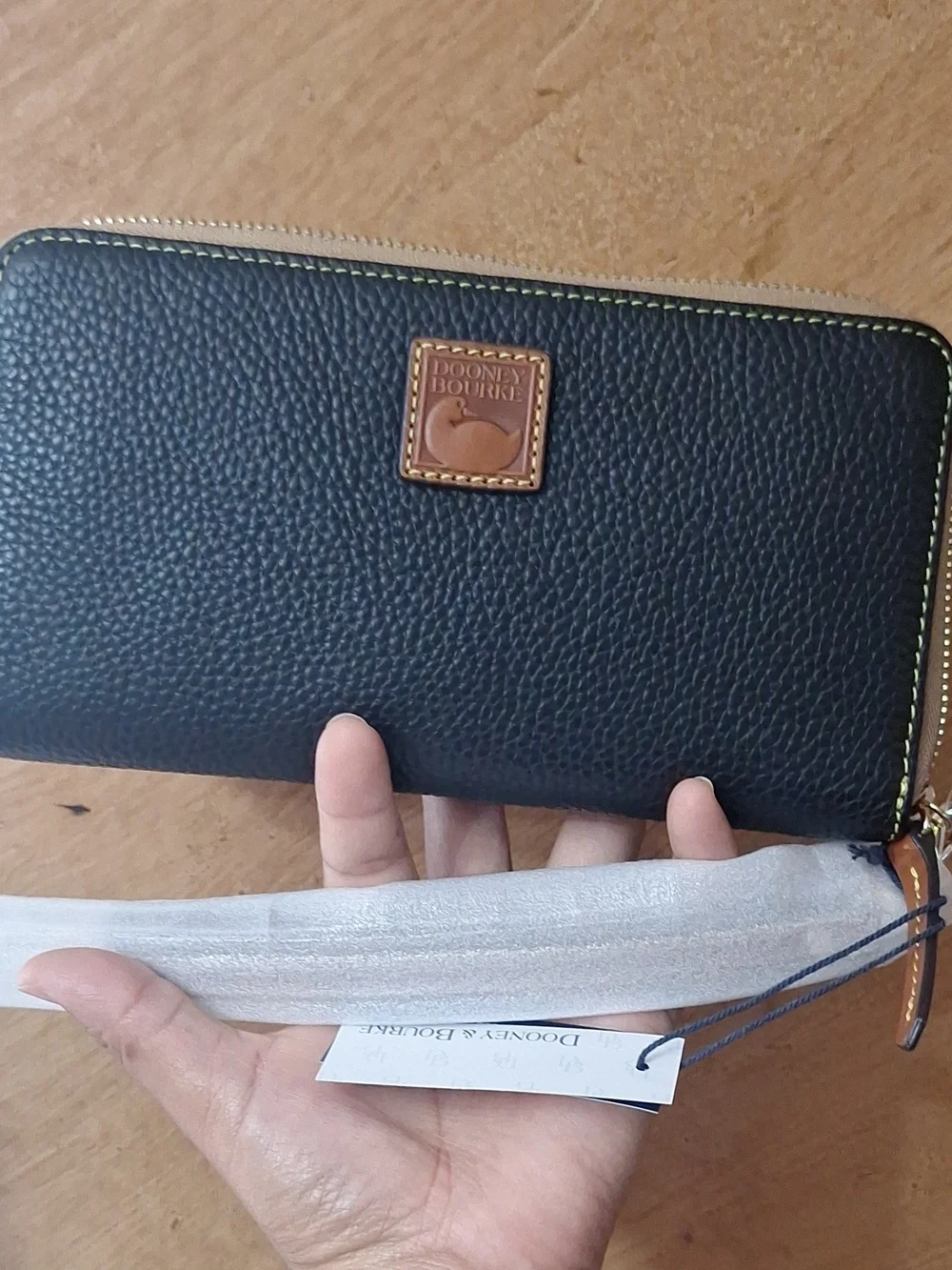 Dooney & Bourke Black Pebbled Zip Wallet with Tan Trim